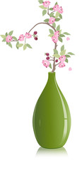 cherry branch in a green vase