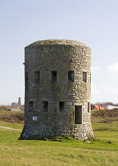 Fototapeta na wymiar loophole towers in Guernsey that guard the coastline.