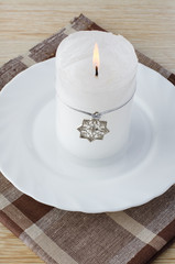 Christmas candle with snowflake