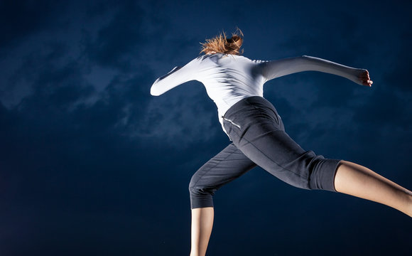 Girl Running At Night