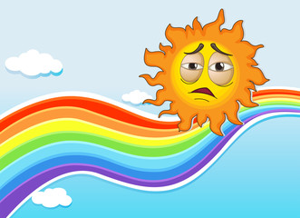 A sky with a rainbow and a sun