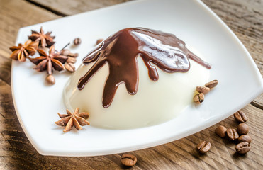 Panna cotta under chocolate topping