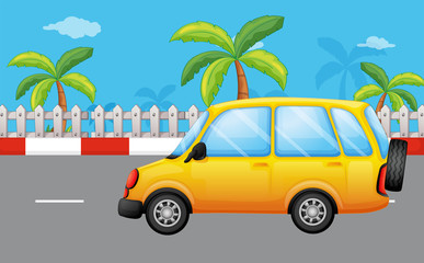 A yellow van at the road