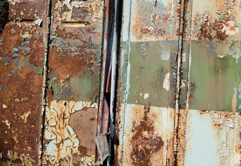 close up of old rusty metal bus door background
