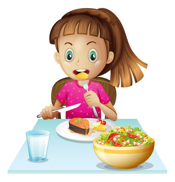 A little girl eating lunch