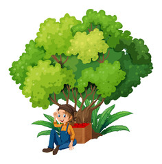 A young farmer under the tree