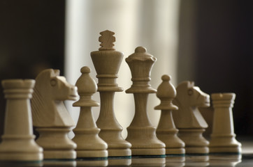 conceprt with chess pieces and lighting on background