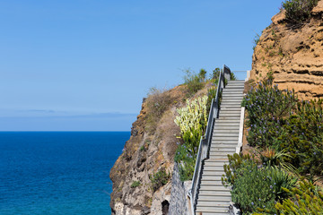 Cliffs with staircase at the coast of Madeira, Portugal