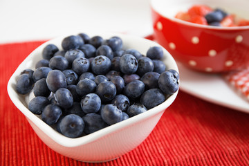 fresh blueberries in ceramic bowl