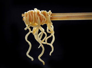 Chopsticks with noodles