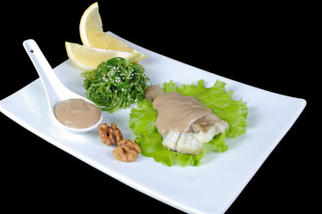 fish (King clip) in lettuce  with seaweed salad, peanut sauce
