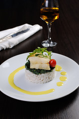 Flounder fillets with risotto and spinach
