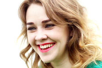 Fototapeta premium Smile blonde girl on a white background
