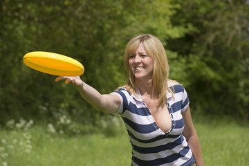 Woman throwing a flying disc