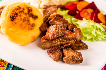 fritada, fried pork, traditional ecuatorian dish.