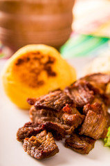 fritada, fried pork, traditional ecuatorian dish.