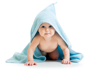 Funny baby boy in blue towel