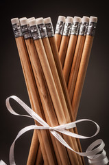 A bunch of wooden pencils tied with a ribbon