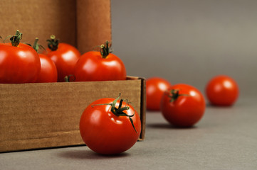 tomatoes close up in a brown box
