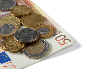 Money: euro coins and bills close up