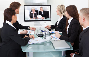 Businesspeople Attending Video Conference