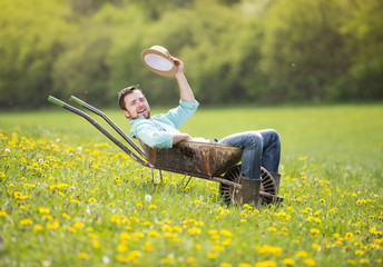 Farmer with wheelbarrow