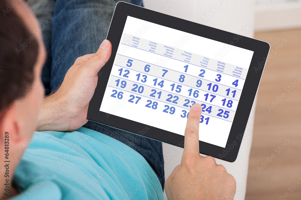 Poster Man Using Calendar On Digital Tablet