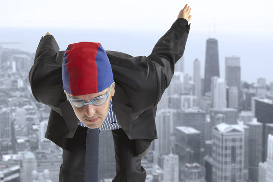 Businessman with swimming gear - Powered by Adobe