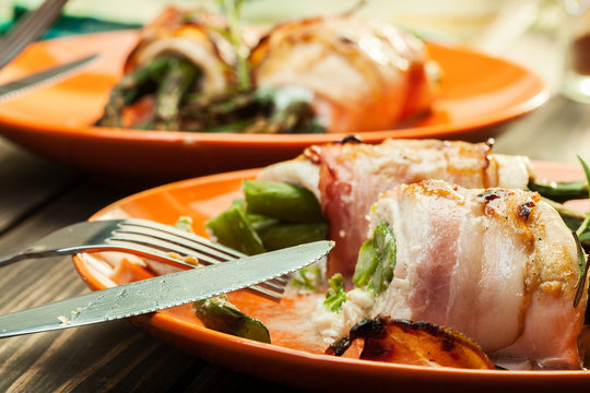 Baked asparagus wrapped in chicken and bacon