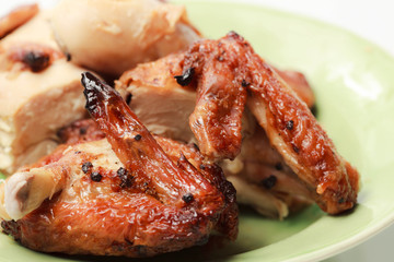 Grilled chicken wing and drumstick