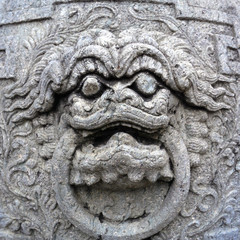 close up Chinese stone statue in Wat Pho, Bangkok, Thailand