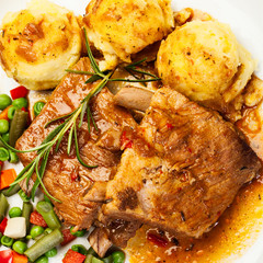 Pork spareribs served with mashed potatoes