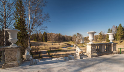 Fototapeta na wymiar Spring park with classical decor