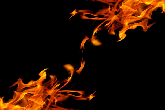 flames of a bonfire on a dark background, abstract background an