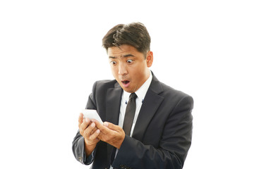 驚くビジネスマン