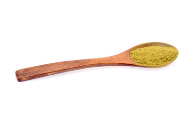 Green Spice in Wooden Spoon Isolated on White Background