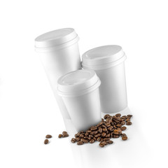 Set of white take-out coffee cups and coffee beans