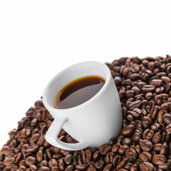 Cup of coffee with coffee beans