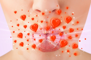 Obraz na płótnie Canvas Pretty lady lips with lovely red hearts