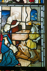 Obraz premium Stained glass - Joseph working as a Carpenter