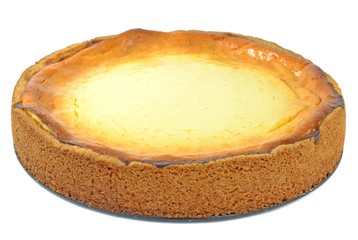 A home made cheese cake on a white background