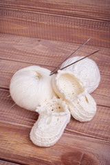 Knitting of white thread and balls