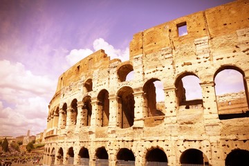 Fototapeta na wymiar Rome, Italy - Colosseum. Cross processing color tone.
