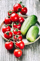 Fresh cherry tomatoes and cucumbers