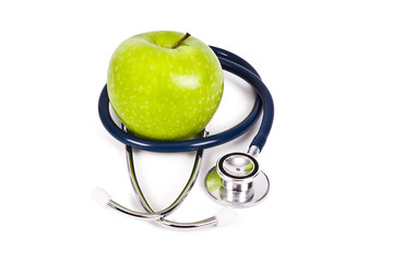 stethoscope and apple isolated on white background