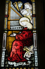 Saint Cecilia, playing organ, stained glass - obrazy, fototapety, plakaty