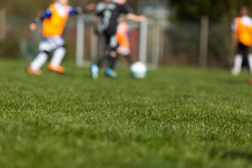 Obraz premium Blurred soccer kids