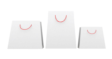 white paper bags of different shapes, red string handles