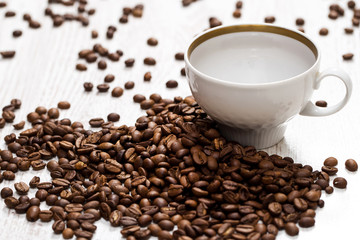 Cup and coffee beans