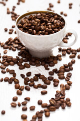 Cup and coffee beans